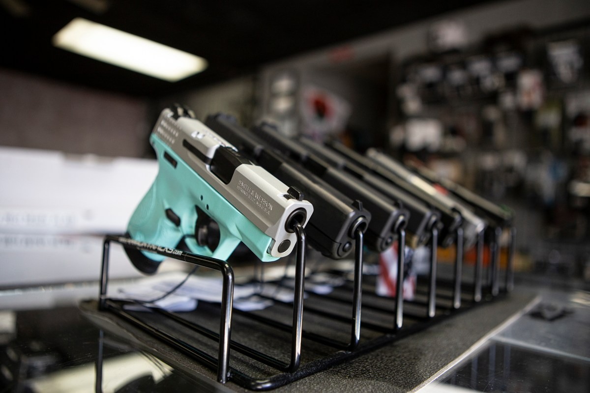 Handguns on display at a gun shop in Fresno County on March 15, 2023. Photo by Larry Valenzuela, CalMatters/CatchLight Local